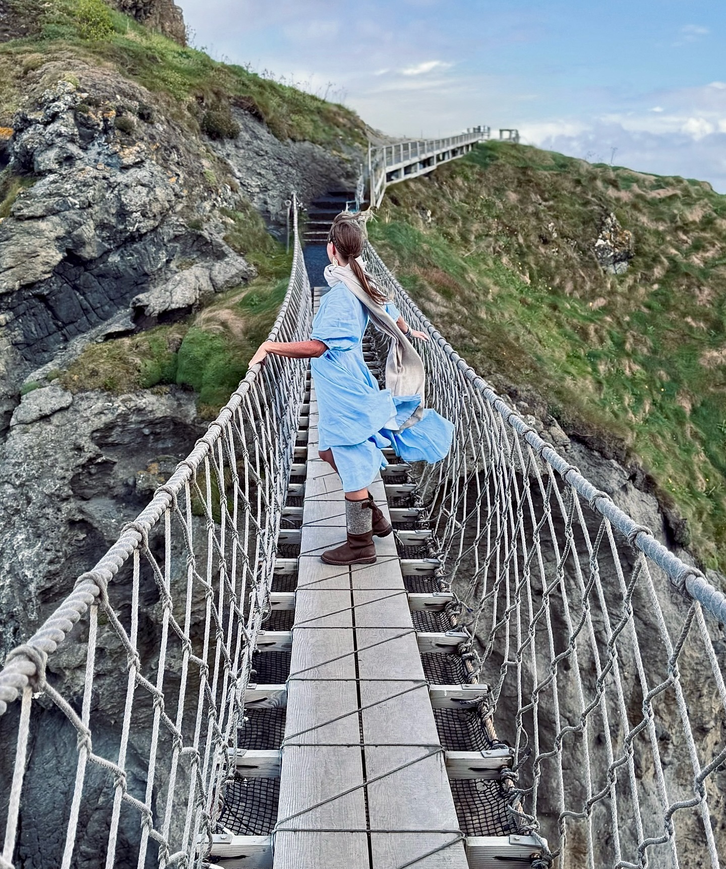 Instagram post by @authenticchica for Tourism Ireland. Caption reads: TRAVEL GUIDE: TOP THINGS TO DO ON A DAY TRIP FROM....