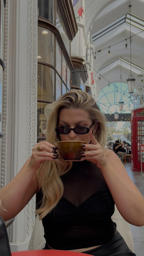 Instagram post by @astoldbymeredith for dpHUE. Caption reads: guys…do i just get bangs atp ?! #ad @dphue glossy....