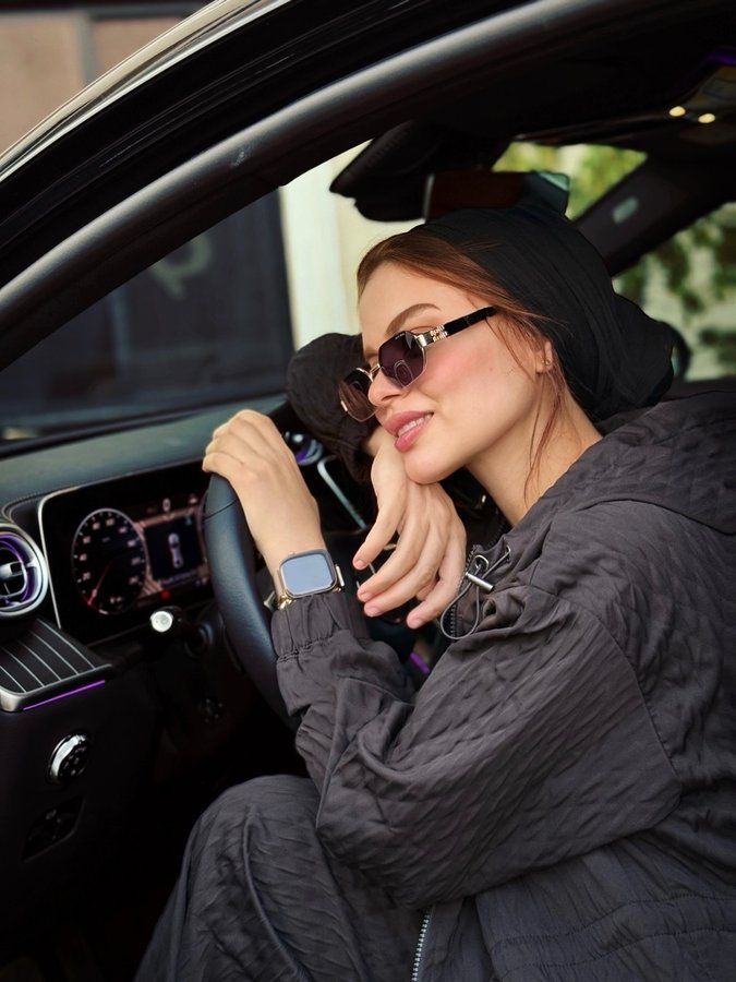 Instagram post by @nesmaelgoharyofficial for The Giving Movement. Caption reads: Obsessed with my The Giving Movement set &....