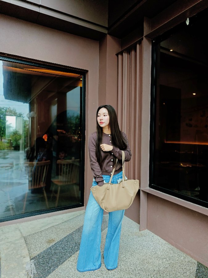 Instagram post by @namorntaraaa for Pomelo Fashion. Caption reads: 🤎

@pomelofashion 
#EmotionalSupportCardigan.