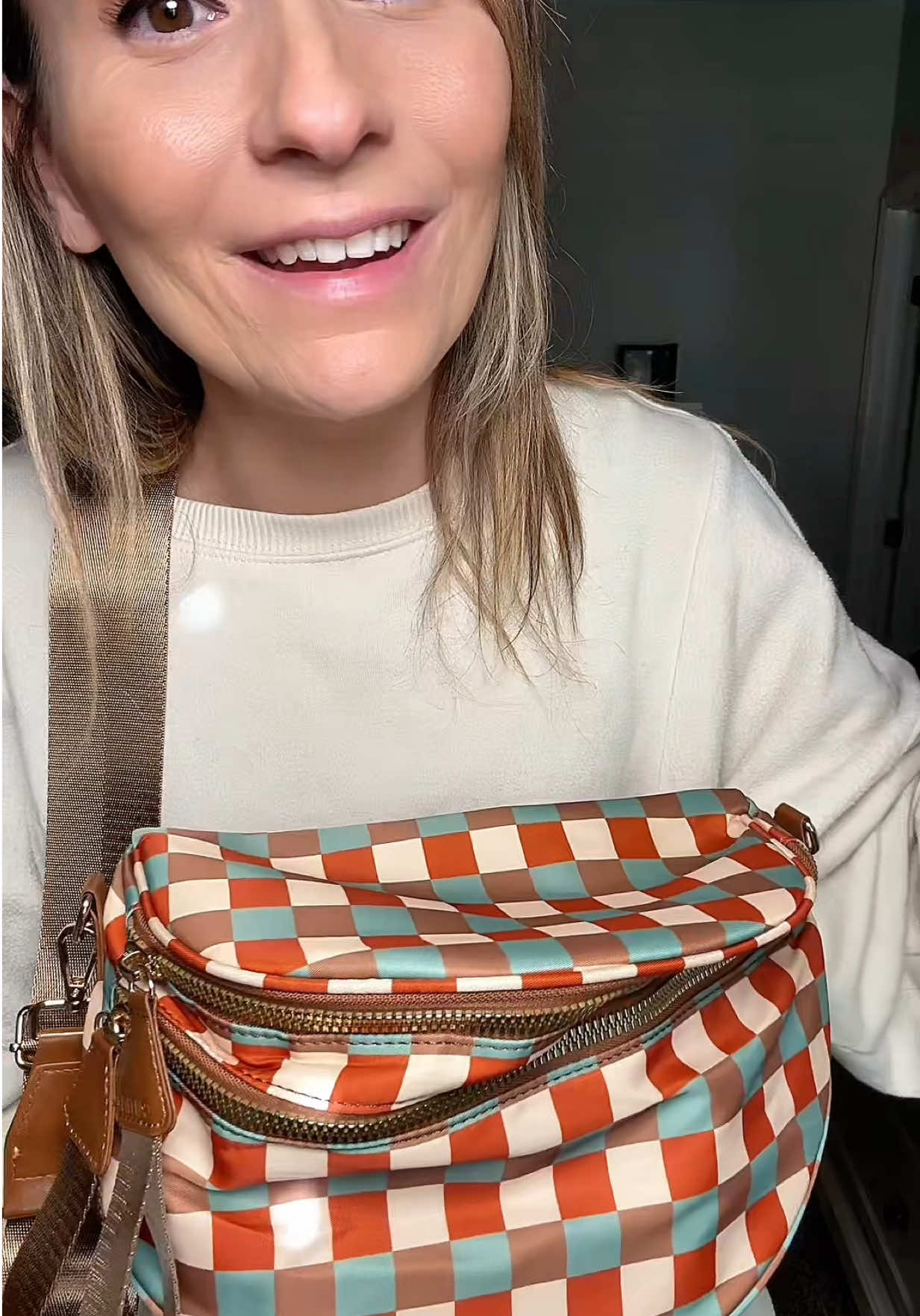TikTok post by @amanda64093 for HKCLUF US. Caption reads: [...] to choose from. #crossbodybag #bumbag....