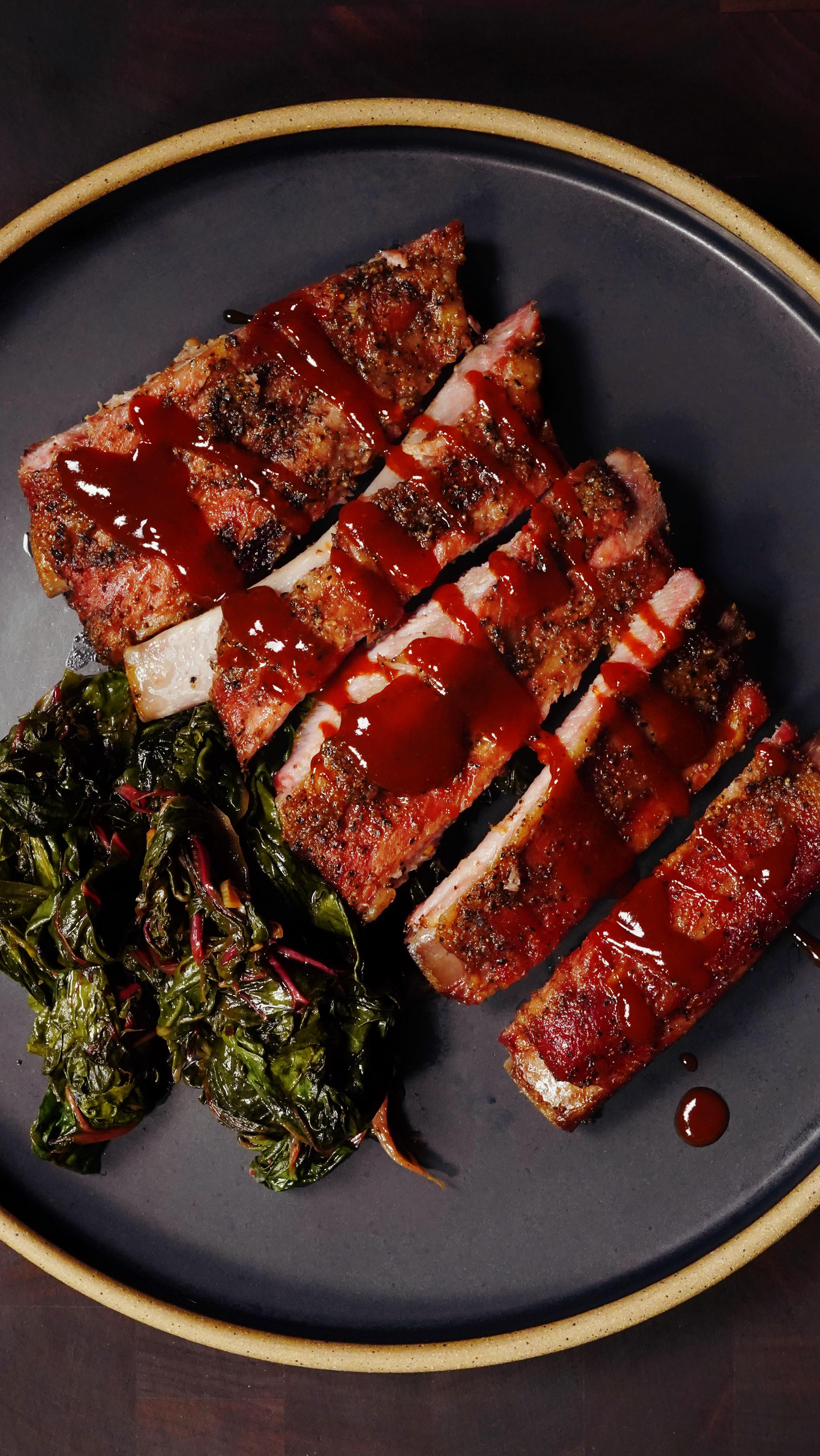 Instagram post by @thisguycooks for Traeger Grills. Caption reads: HONEY BOURBON RIBS – Rubbed and smoked slow on the....