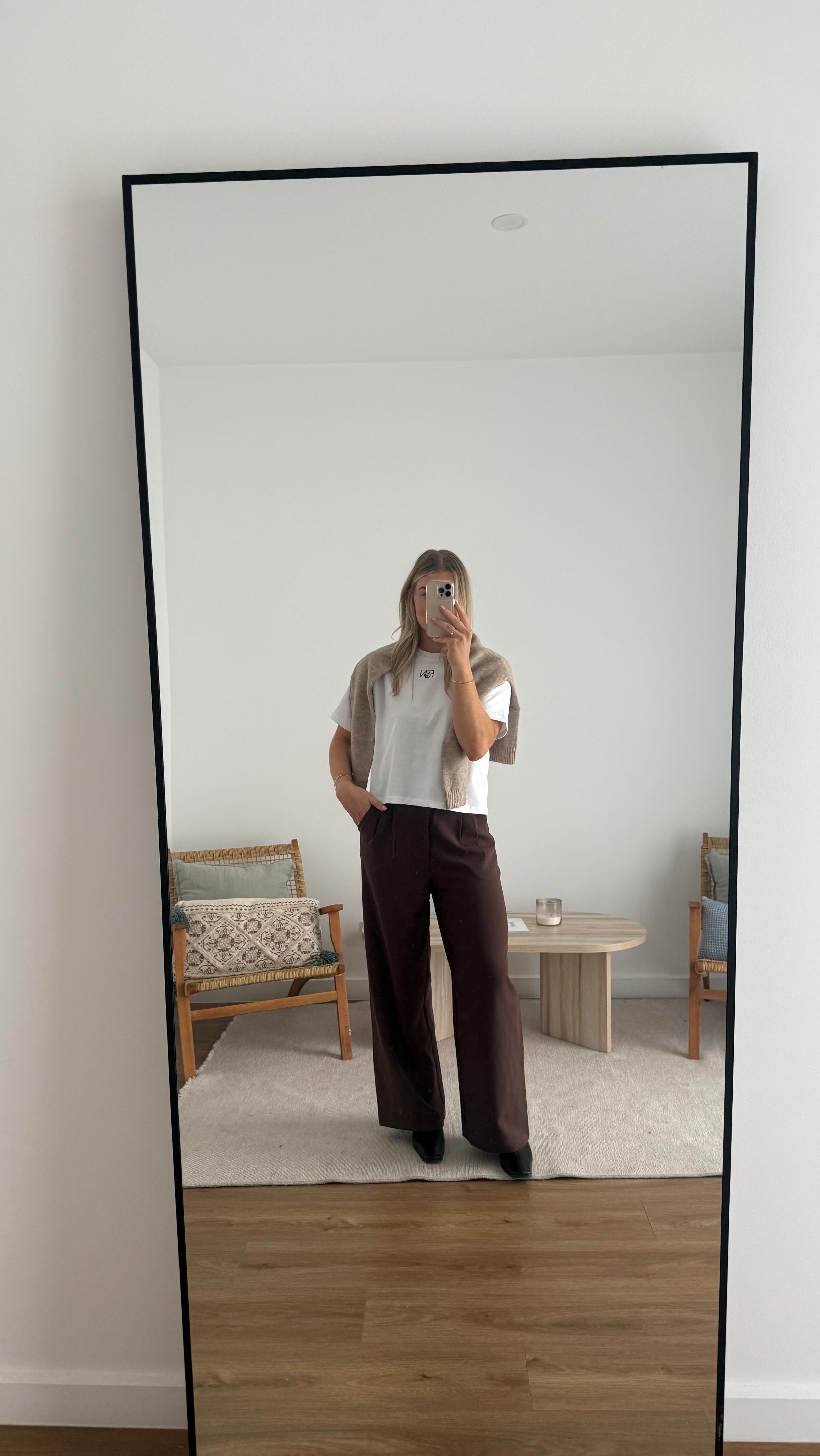 Instagram post by @emilyelizabeth.w for Feather + Noise. Caption reads: Roll Call Ready 🤎 6 Outfits for Term 3 with....