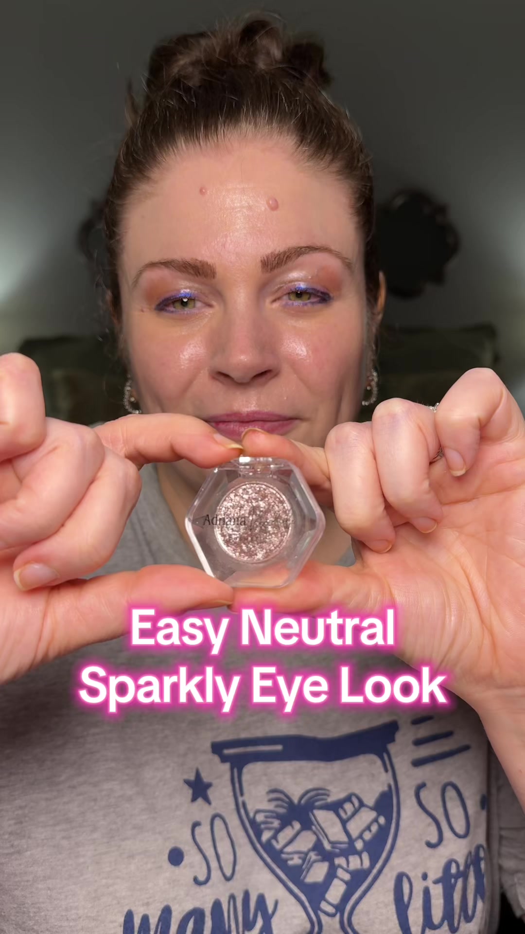 TikTok post by @melissa_beautyover40 for Adriana Nichole Cosmetics. Caption reads: [...] DuoChrome eyeshadow from @Adriana Nichole....
