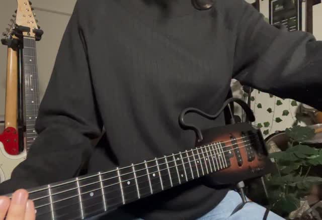 Instagram post by @thegirlwithredguitar for DonnerMusic. Caption reads: Using Hush X from @donnermusic_official....