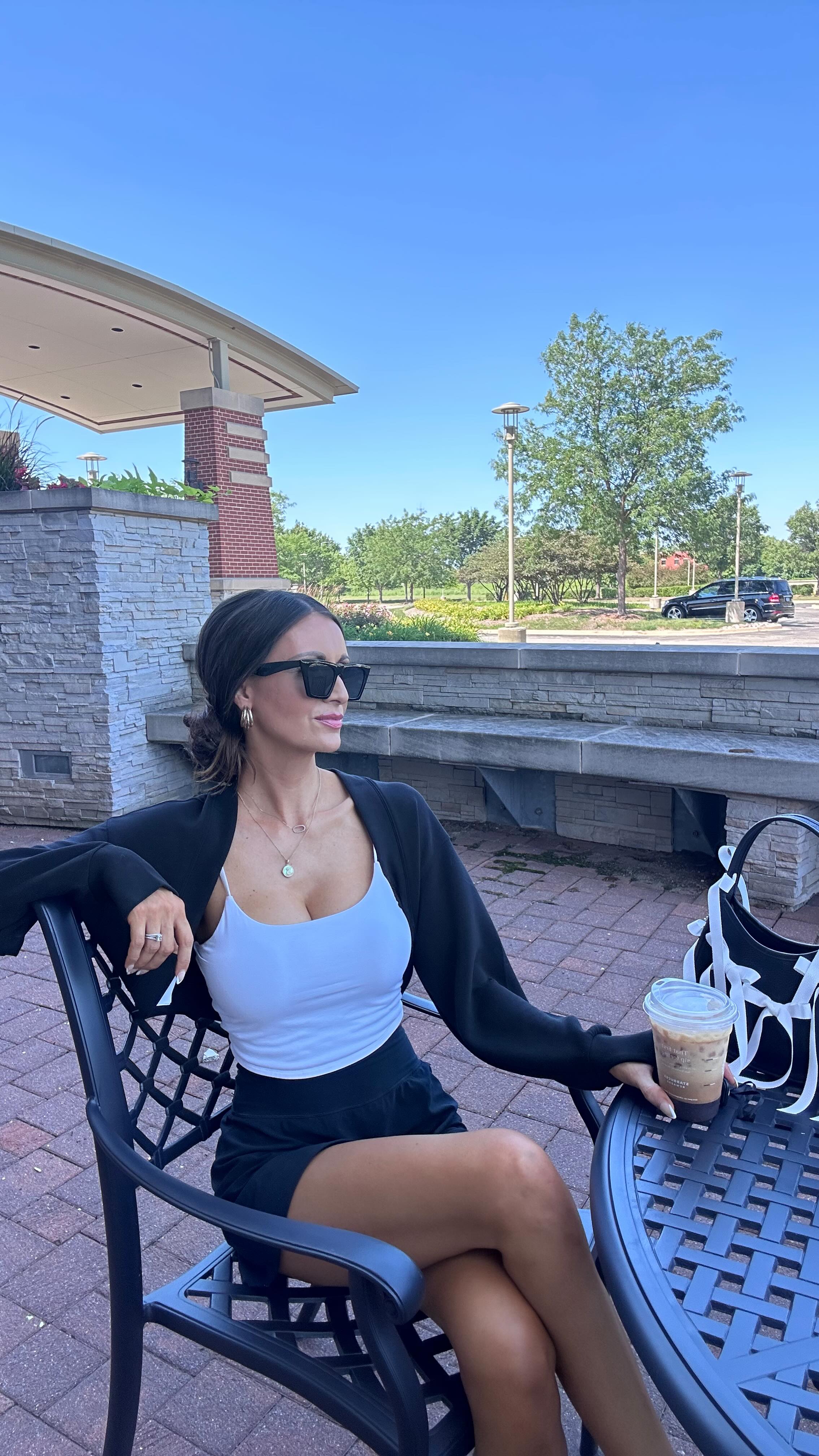 Instagram post by @sheriemarie1 for SPANX. Caption reads: #onthegostyle 🖤🤍 @spanx #spanxpartner 

Follow....