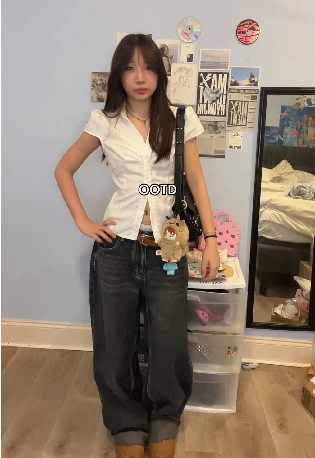 TikTok post by @phoe4ter for Emmiol. Caption reads: I love these jeans so much 😭💕 Jeans from @EMMIOL....