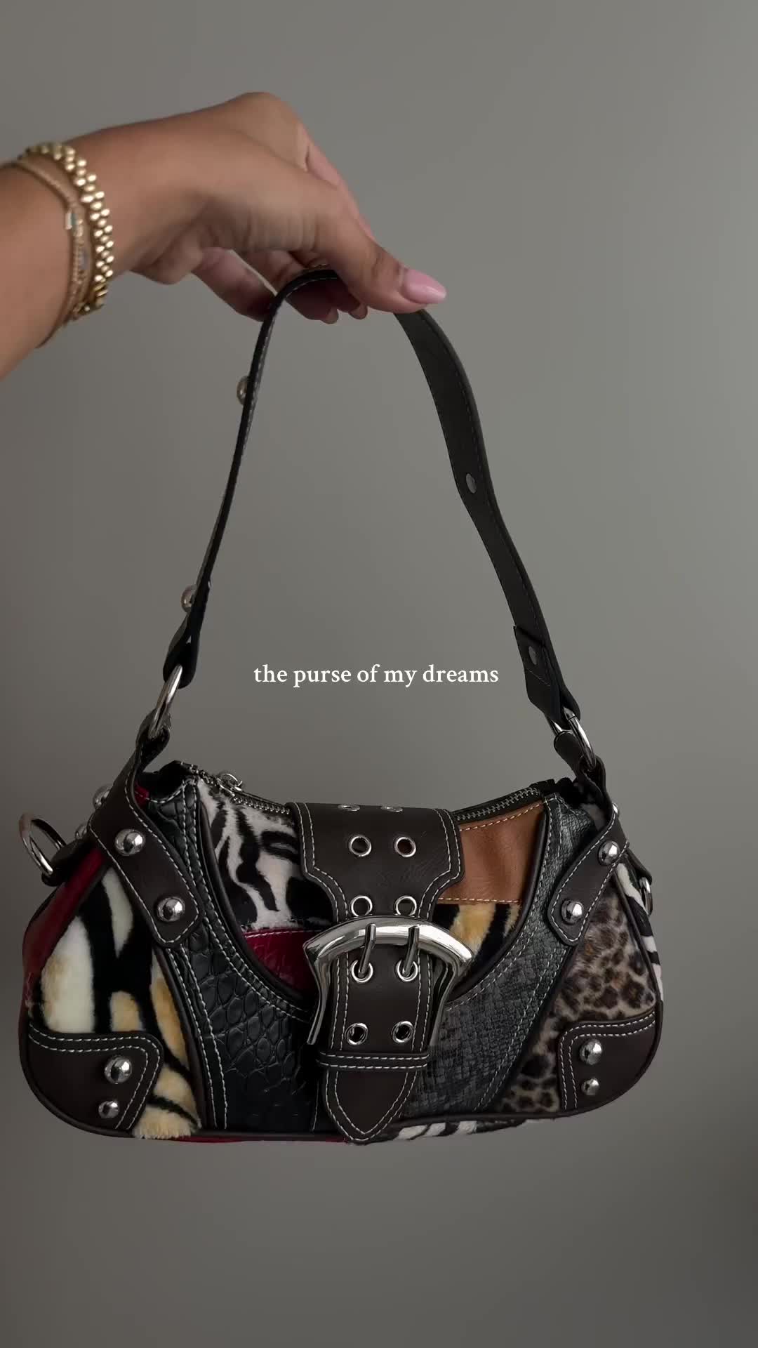 TikTok post by @italiajjacqueline for Dolls Kill. Caption reads: [...] #purse #handbag #shoulderbag #dollskill....