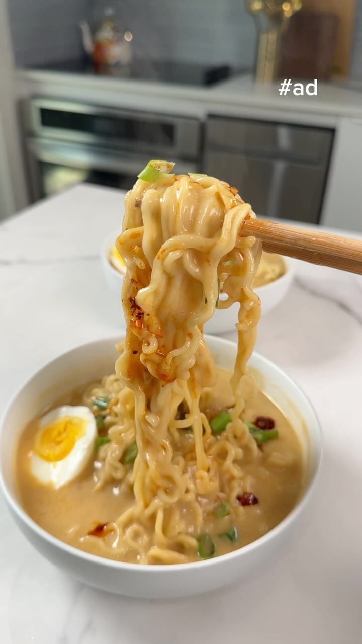 Instagram post by @themoodyfoody for Campbell's. Caption reads: #ad Creamy Chili Garlic Ramen using my secret....