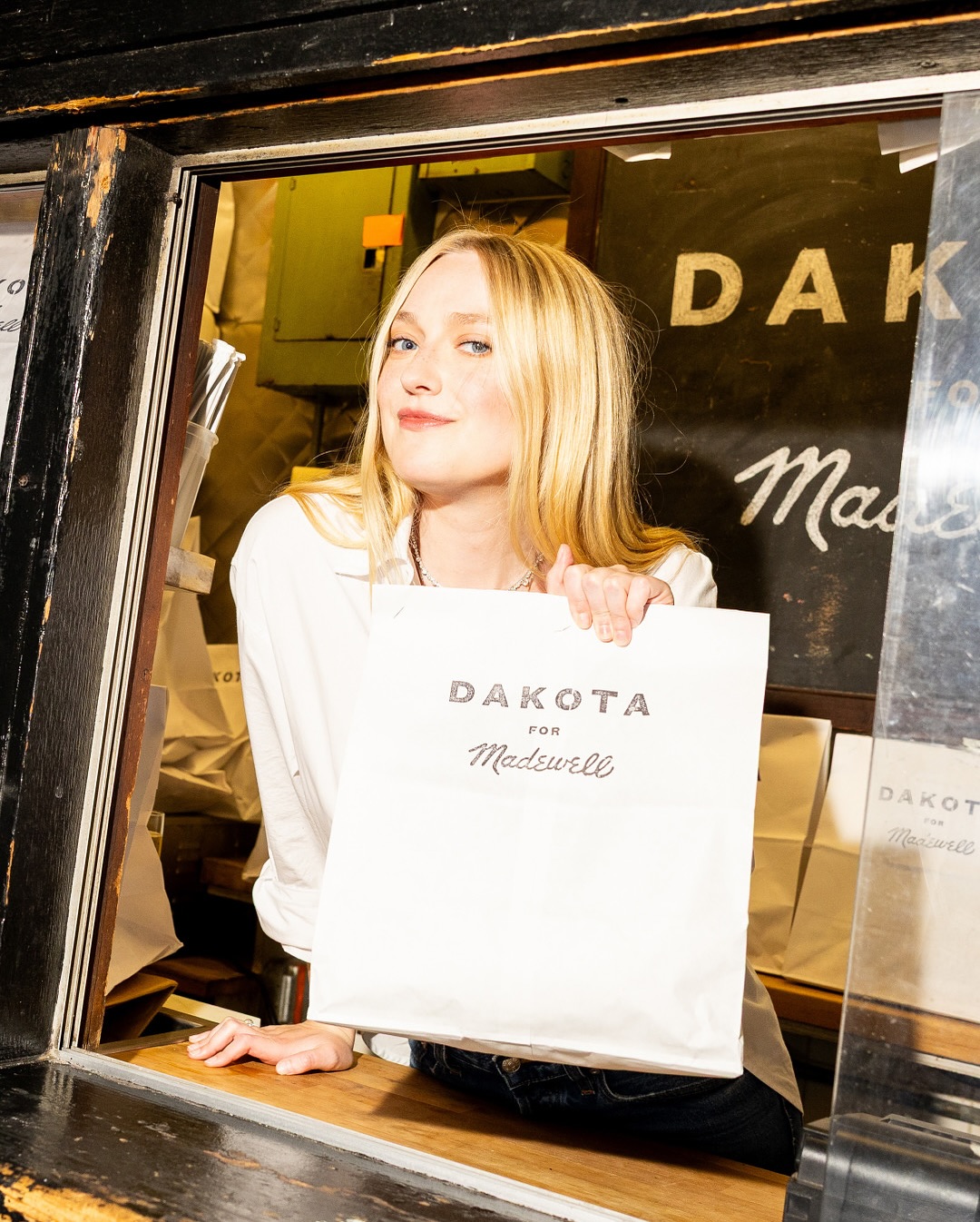 Instagram post by @dakotafanning for Madewell. Caption reads: Last night at Fanelli..