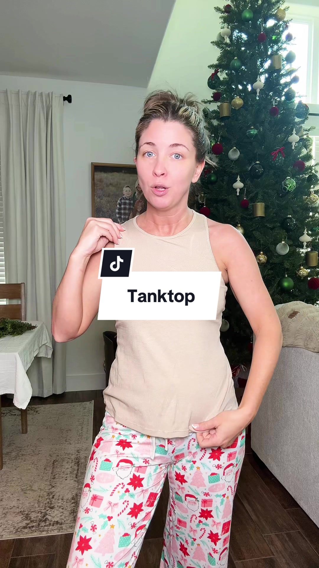 TikTok post by @kimberly_pugh for Kali rose boutique. Caption reads: @Kaliroseboutique #tanktop #builtinbra #fashiontok....