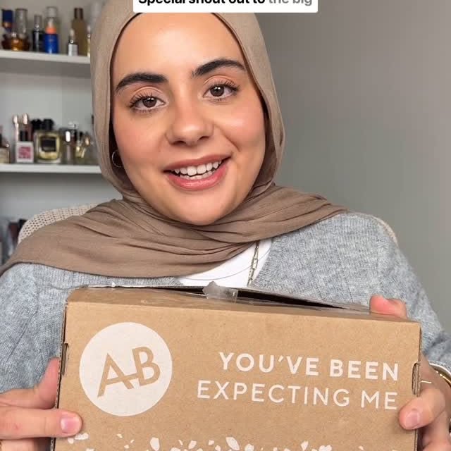 Instagram post by @raziamoe for Adore Beauty. Caption reads: When the team behind the free @timtam drops....