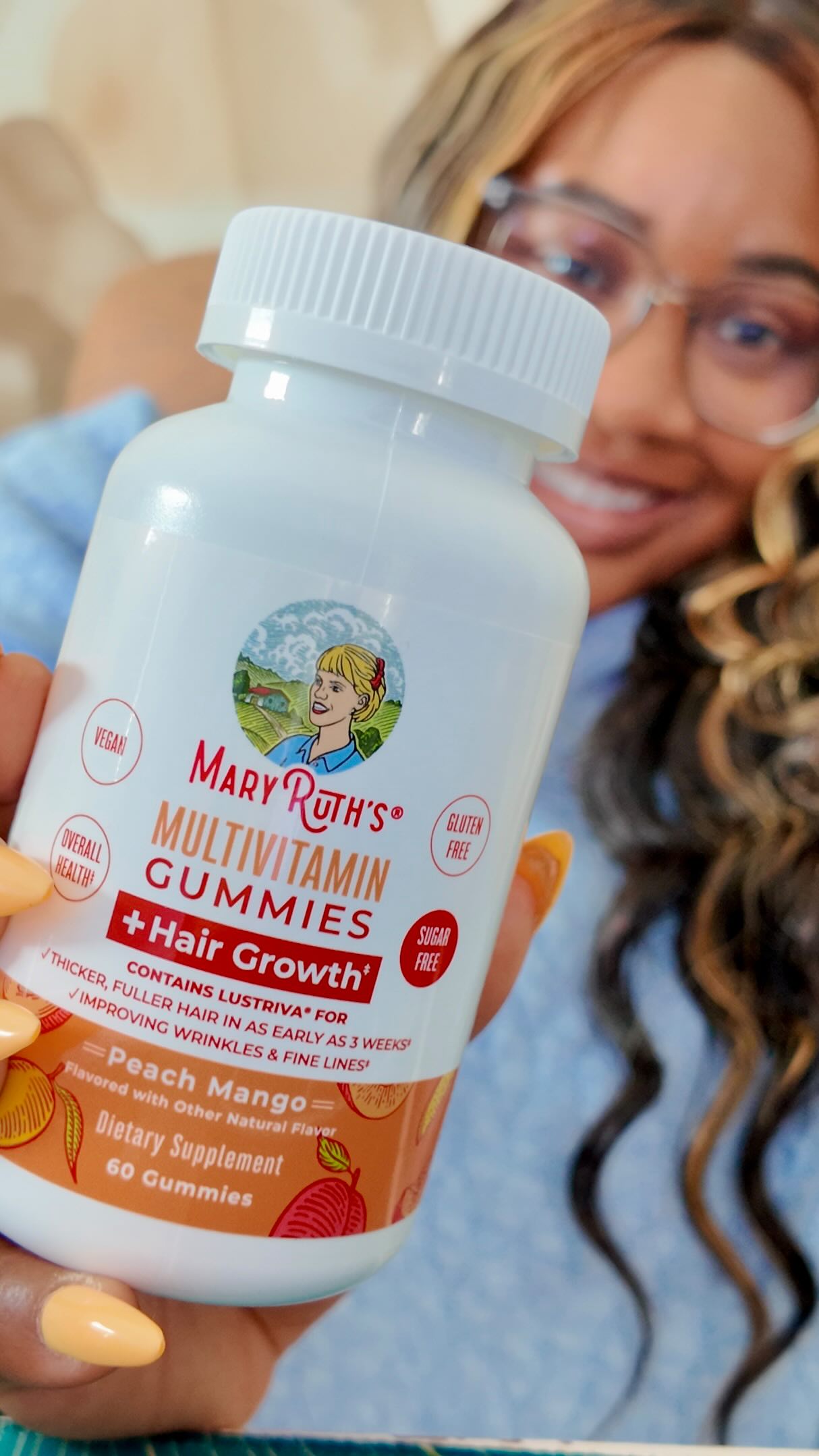 Instagram post by @laurinjo for MaryRuth Organics. Caption reads: Some people take their vitamins with water. I take....