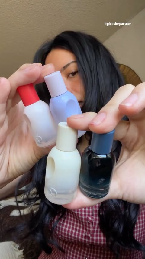 Instagram post by @jessaminesblack for Glossier. Caption reads: Divas, they shrunk the @glossier You bottles 🤏🏽....