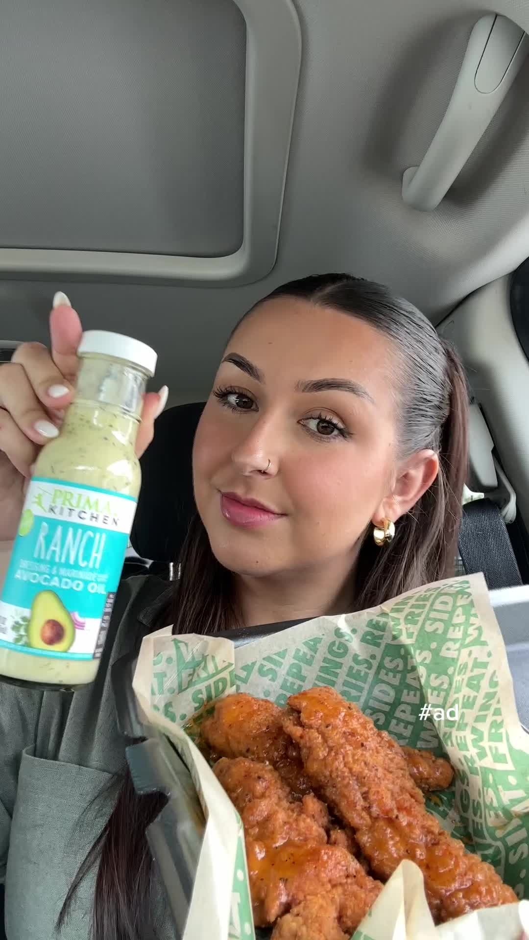 TikTok post by @samnoms for Mark's Daily Apple. Caption reads: eating hot honey tenders from @Wingstop with ranch....