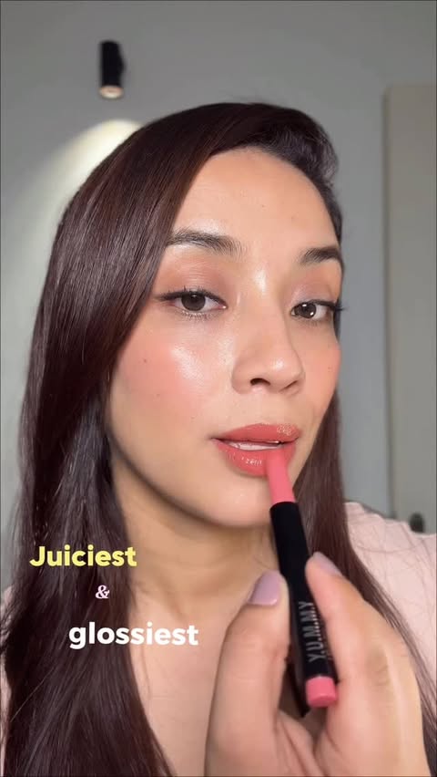 Instagram post by @nancyapproves for Staze Beauty. Caption reads: comment down for link 

#peachlipstick #lipgloss....