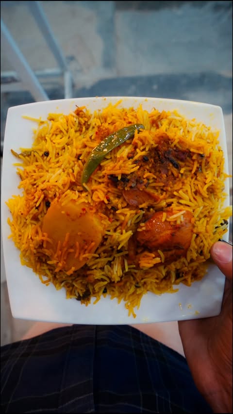 Instagram post by @naveeedddmughal for National Foods. Caption reads: Is Eid pay, karachi ki best biryani ab aap kay....