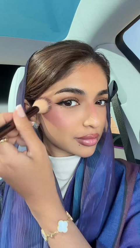 Instagram post by @anudalamri for Armani beauty. Caption reads: Colorful look by @armanibeauty #fregrance #makeup....