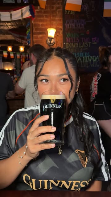 Instagram post by @tropicalcandice for Guinness. Caption reads: #ad @guinnessus #guinnesspartner ✨ proof that the....