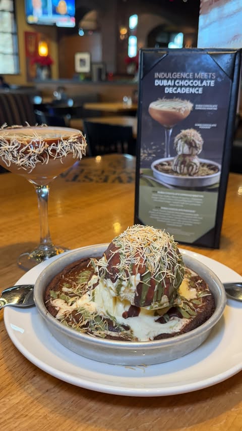 Instagram post by an influencer for BJ's Restaurant & Brewhouse. Caption reads: The new Dubai Chocolate Pizookie at BJ’s is a....