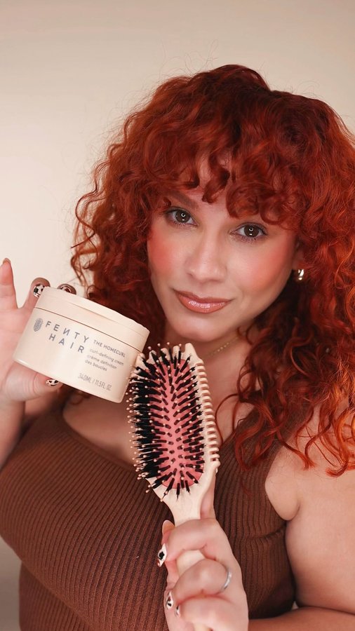 Instagram post by @andreacristina_az for FENTY HAIR. Caption reads: [...] we all needed!!! Bounce Curl Brush x Fenty....