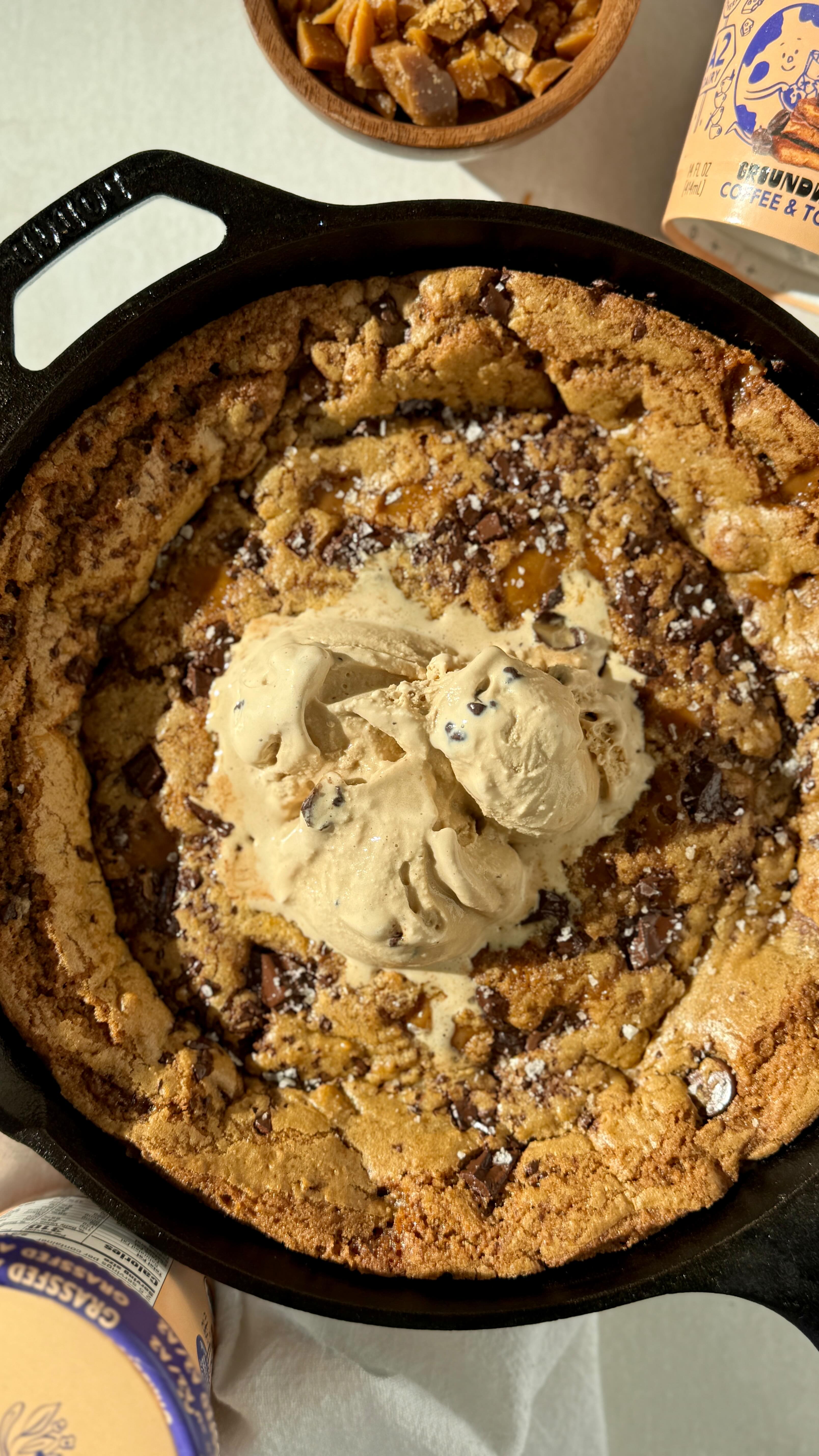 Instagram post by @_emmasplate for Alec's Ice Cream. Caption reads: Brown Butter Coffee Toffee Cookie Skillet with....