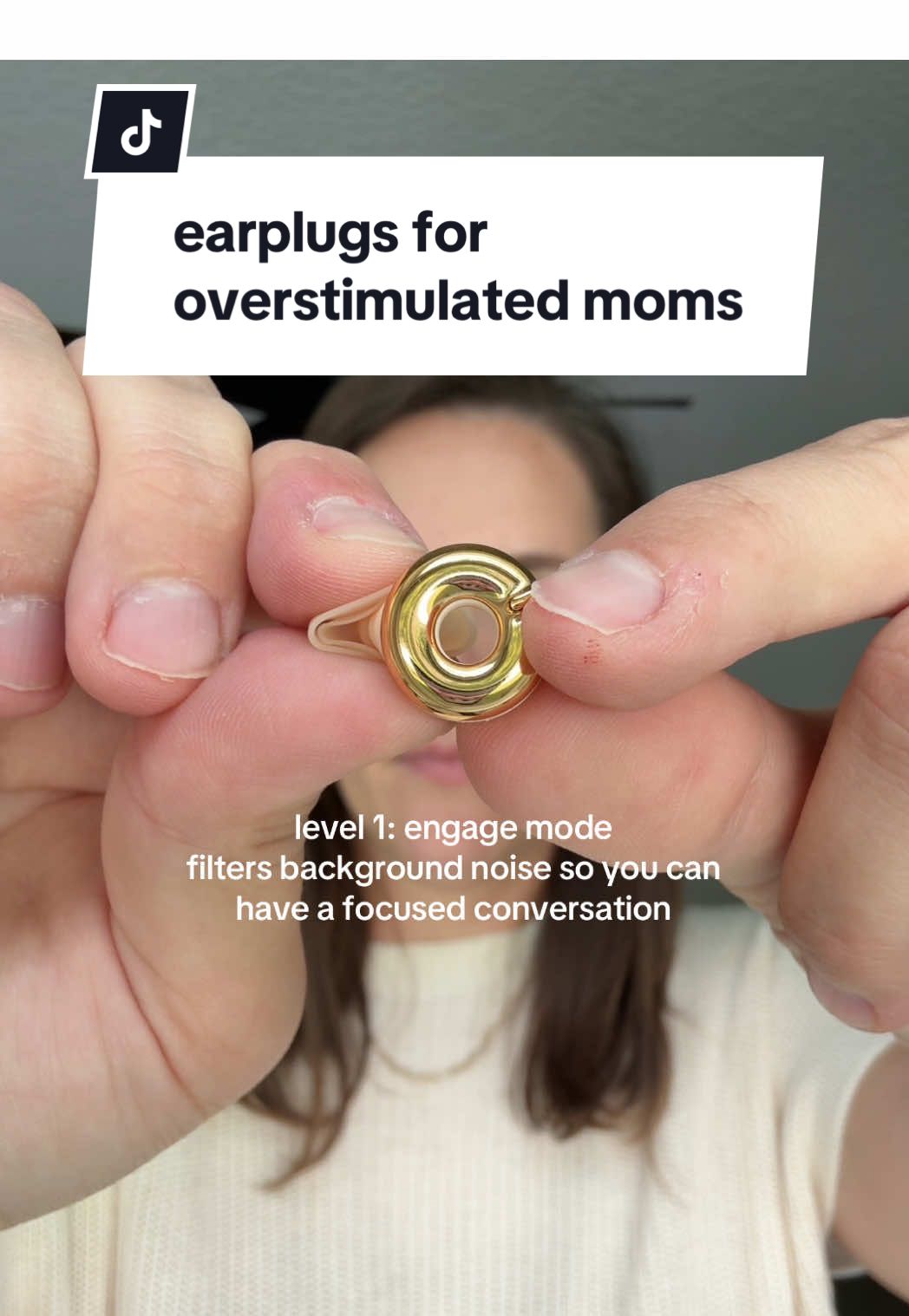 TikTok post by @the.florida.sahm for Loop Earplugs. Caption reads: [...] yourself to a pair of mom @LoopEarplugs to....
