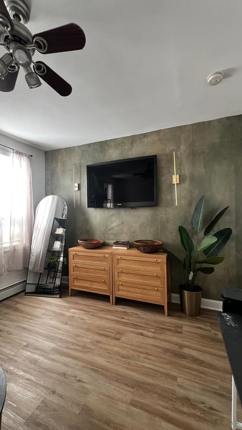 Instagram post by @tylerdenae for Wallblush. Caption reads: After looking at over 50 different wallpaper....