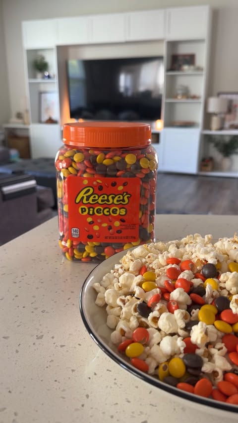 Instagram post by @alexgracelindsay for SheSpeaks. Caption reads: #Reeses_Partner movie night 🤝sweet treat If you....