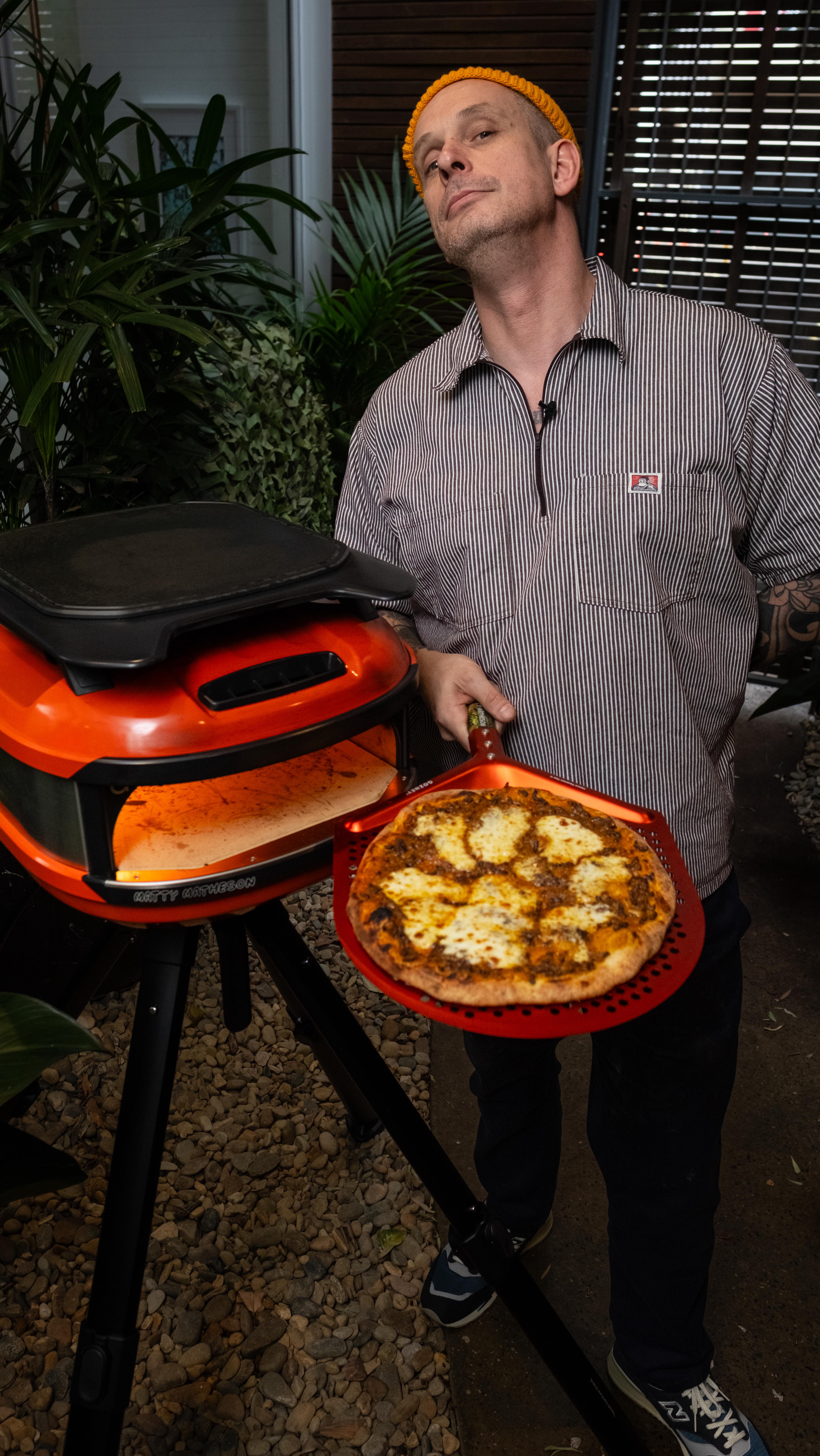 Instagram post by @andyhearnden for Gozney. Caption reads: [...] Get You Laid Lasagna’ Pizza made....