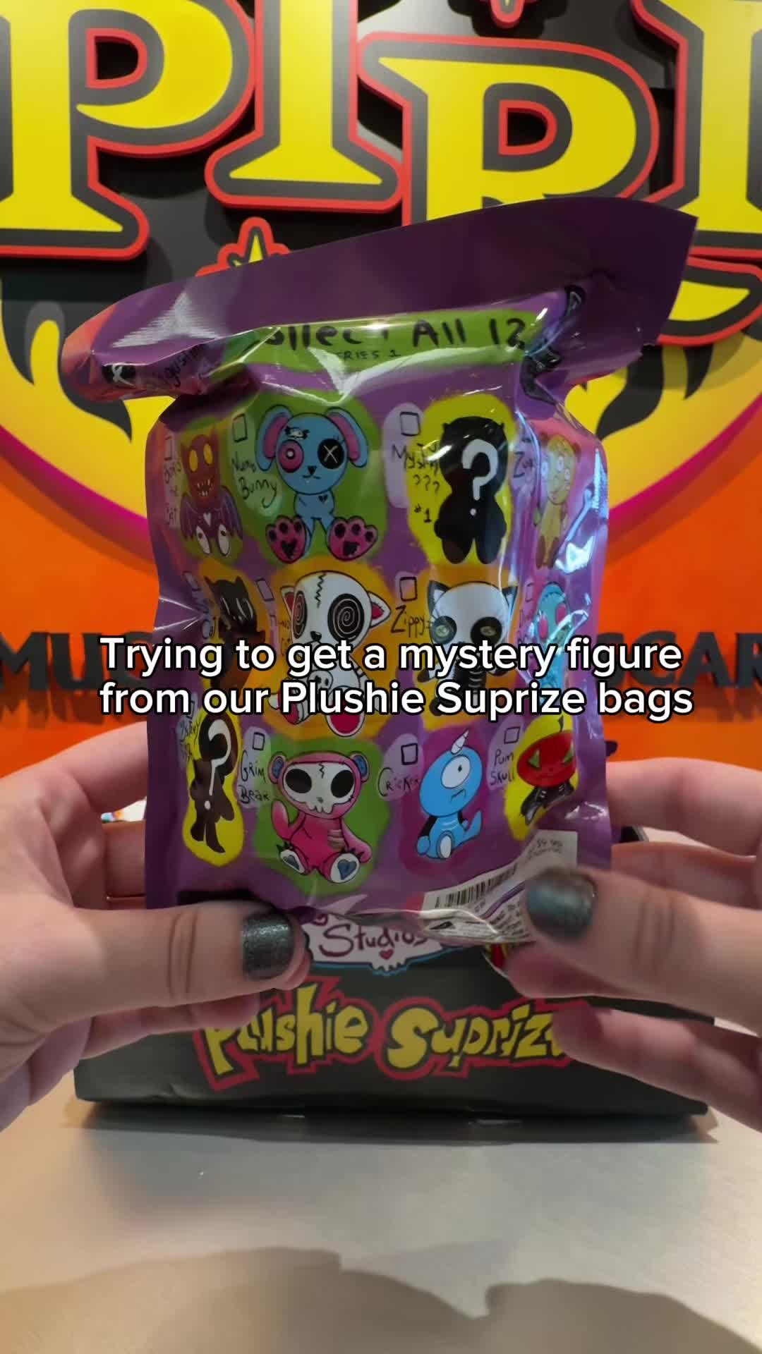Instagram post by @gusfink for Spirit Halloween. Caption reads: Can you score a @gusfink mystery plush? Head to....