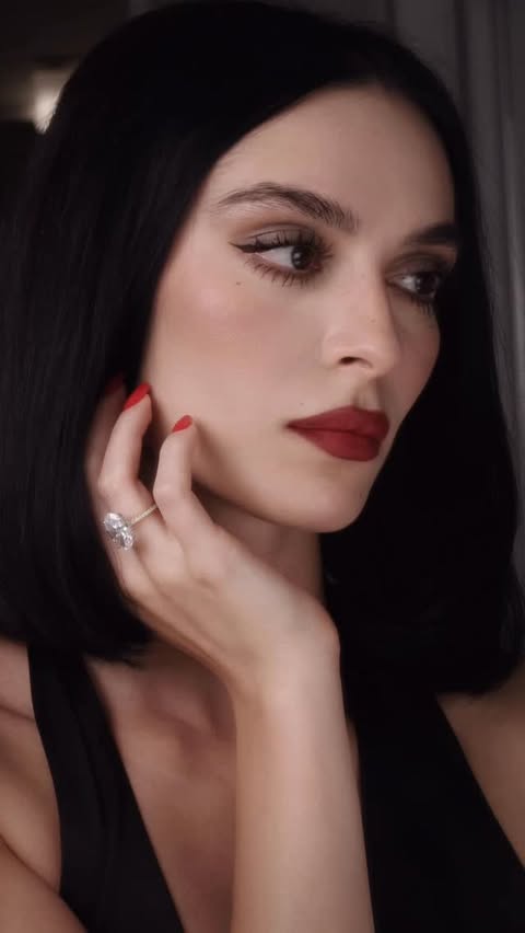 Instagram post by @minazibayi for Dolce&Gabbana. Caption reads: AD . Vampy looks are my favorite🧛‍♀️ what do we....