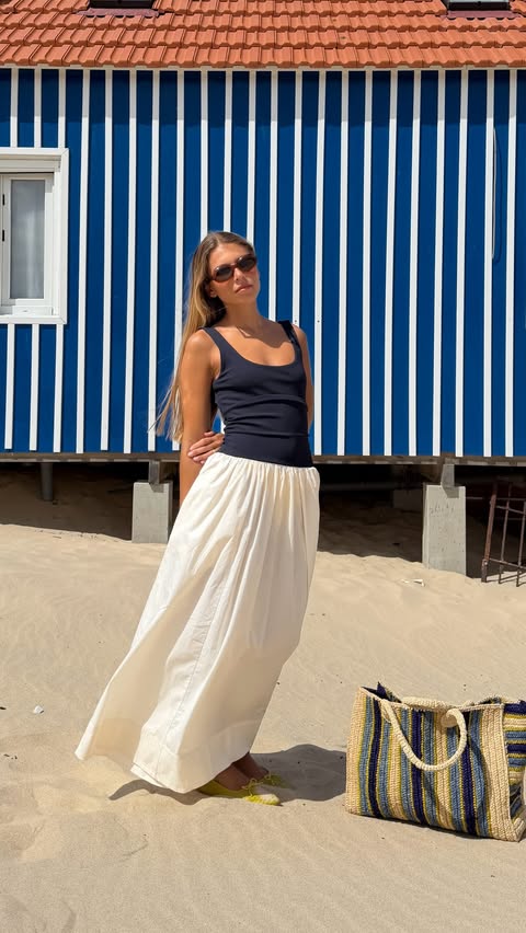 Instagram post by @ritamontezuma for Banana Republic. Caption reads: Beach ➡️ Dinner - all in @bananarepublic !!....