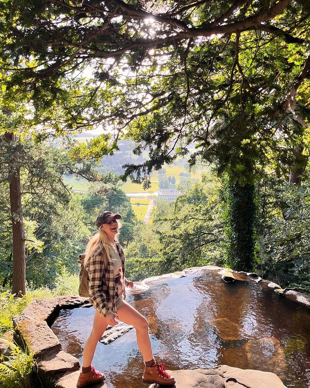 Instagram post by @liv_in_the_country for Danner. Caption reads: Evening walks around the beautiful Chatsworth....