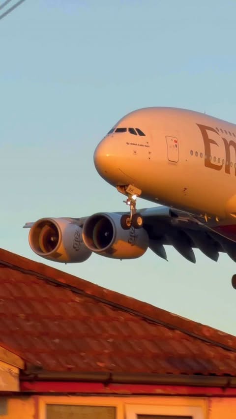 Instagram post by @elemer.aviation for Emirates. Caption reads: Massive A380 flies extremely close to house!....
