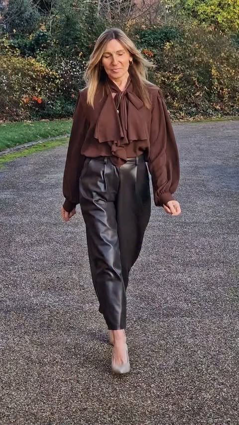 Instagram post by @tracys_fashion_style for Blue Vanilla. Caption reads: [...] trousers @primark 
Pussy bow blouse....