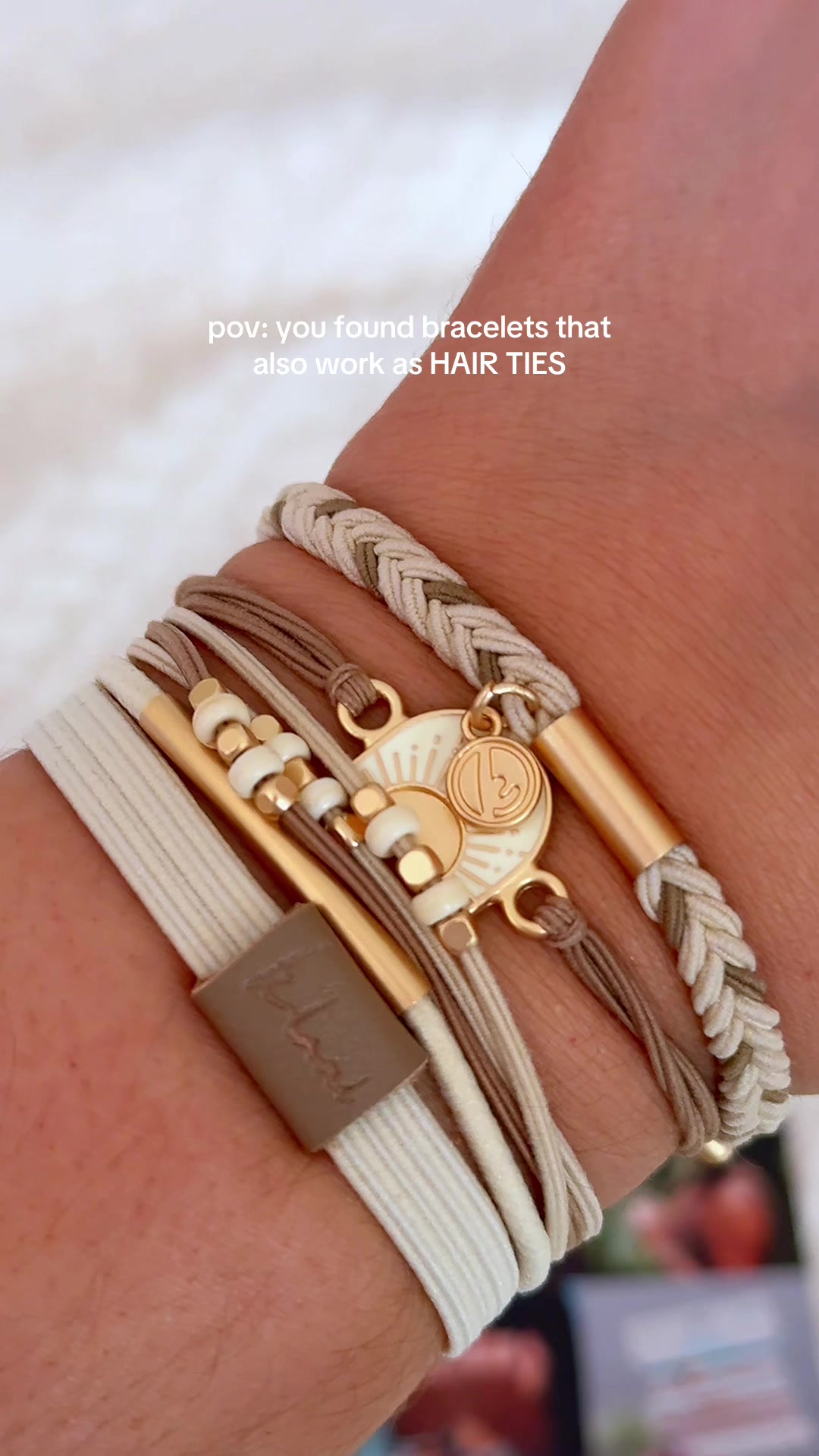 TikTok post by @naomikaylaa for K’Lani. Caption reads: pov: you found bracelets that also work as hair....