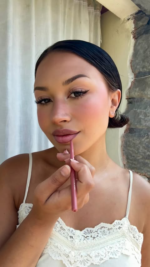 Instagram post by @callmekyomi for Max Factor. Caption reads: [...] without my lip liner + gloss 🫦 @maxfactor....