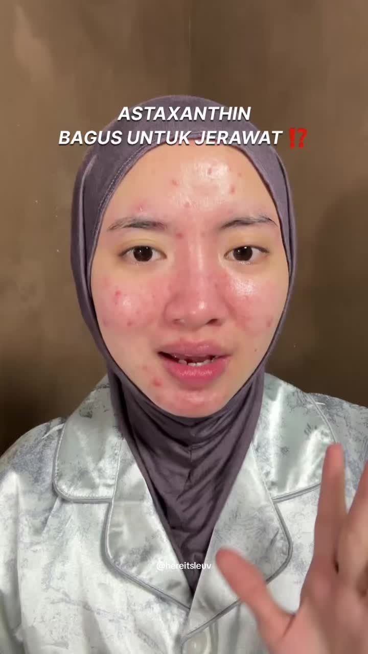 TikTok post by @hereitsleuv for Natur-e. Caption reads: [...] sure), yang aku minum astaxanthin dari....