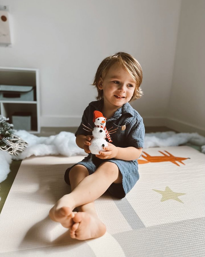 Instagram post by @thesunshinestatemom for Tiny Land. Caption reads: 🎄 Creating holiday magic on the @TinyLand Forest....