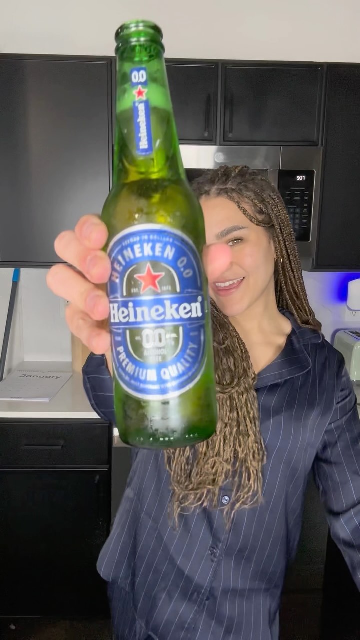 Instagram post by @ivylis for Heineken US. Caption reads: Winding down & straightening up with @heineken_us....