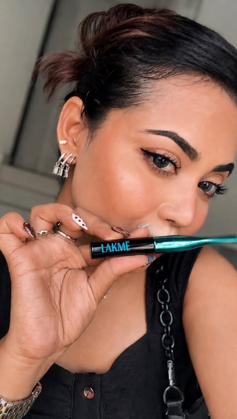 Instagram post by @_sharmili_ for Lakmé. Caption reads: [...] been doing this tiny lifted wing with the....