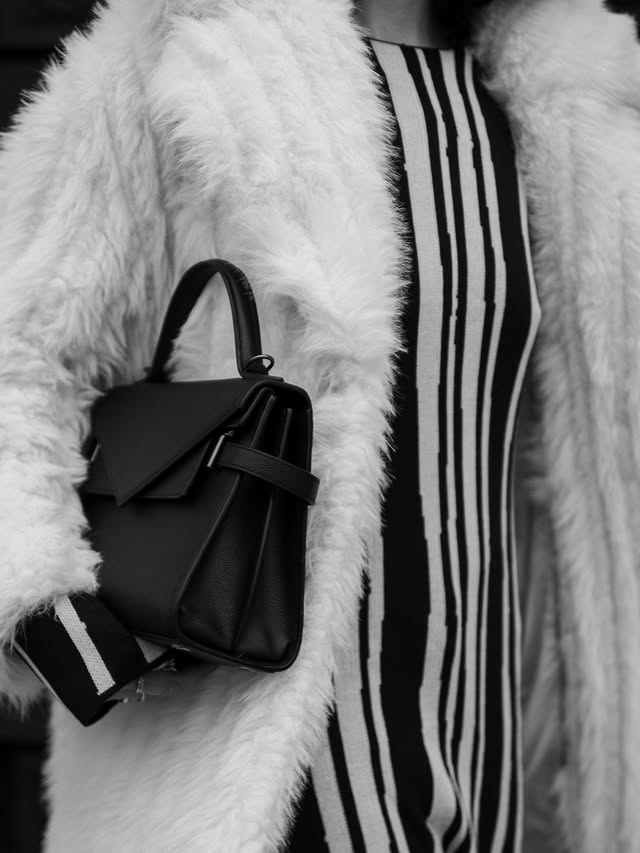 Instagram post by @sabrinawayneee for Le Tanneur. Caption reads: black, white and everything in between. | enthält....