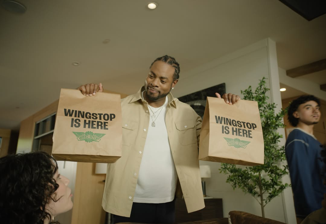 Instagram post by @rsherman25 for Wingstop. Caption reads: [...] ready for game night? I know I am 👀....