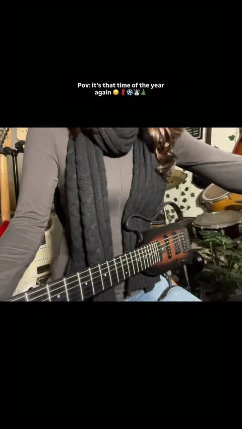 Instagram post by @thegirlwithredguitar for DonnerMusic. Caption reads: Using Huh X from @donnermusic_official 
#christmas....