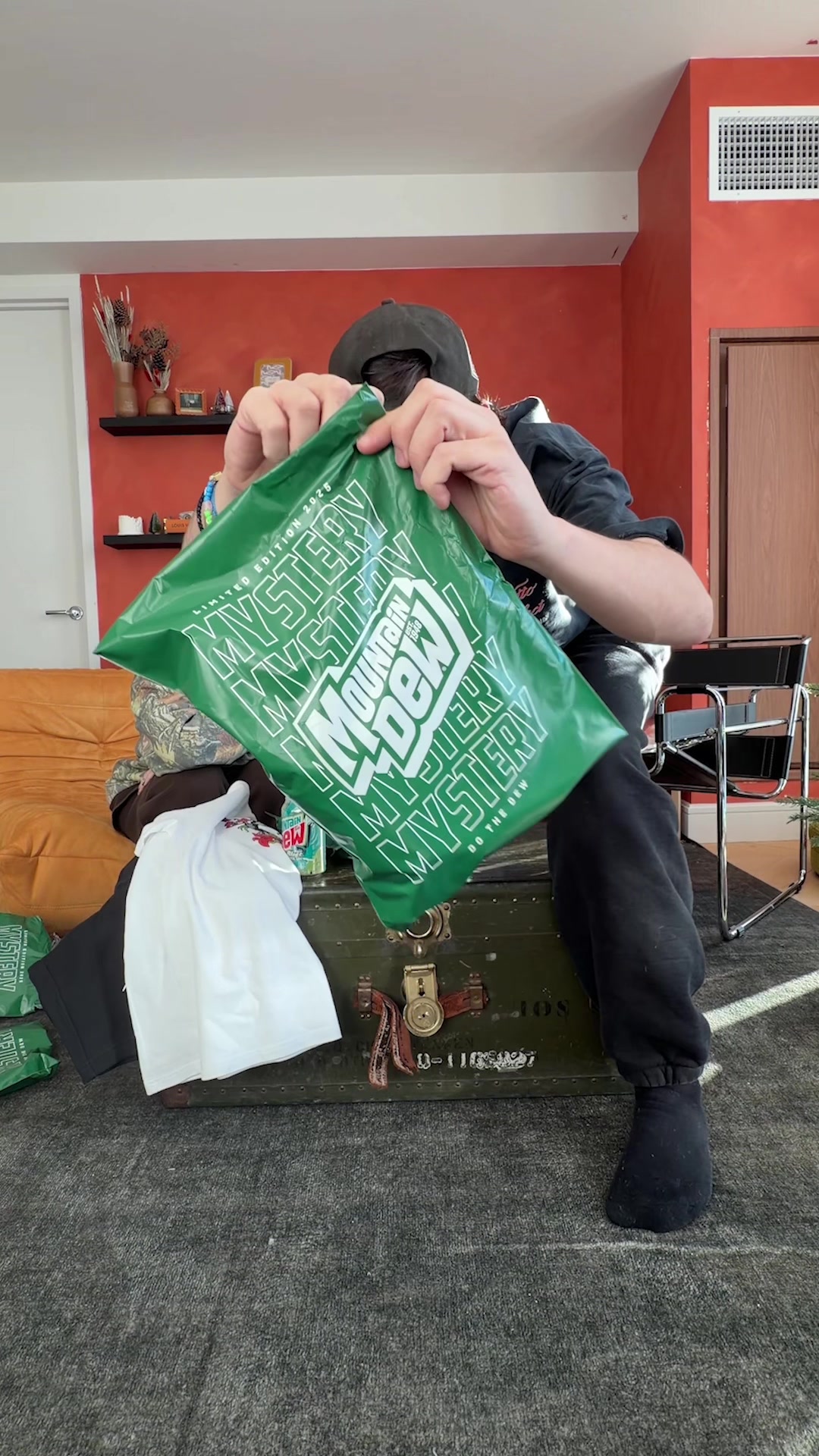 TikTok post by @adrianvvlogs for Mountain Dew. Caption reads: Unbox @Mountain Dew new Mystery Bundle with me!....