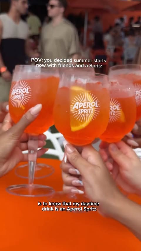 Instagram post by @shaiannj for Aperol Spritz. Caption reads: [...] Be(ing) the Moment with friends and....