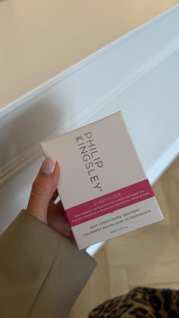 Instagram post by @izzyutterson for Philip Kingsley. Caption reads: ad I've spoken about this product so many times....