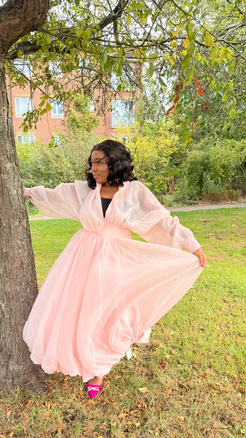 Instagram post by @leendah_aj for Sunfere. Caption reads: [...] Deep V-neck Puff Sleeve Maxi Dress from....