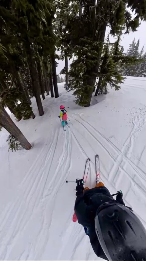Instagram post by @motherhood.outdoors for Cardo Systems. Caption reads: No one warned me about this part of skiing with....